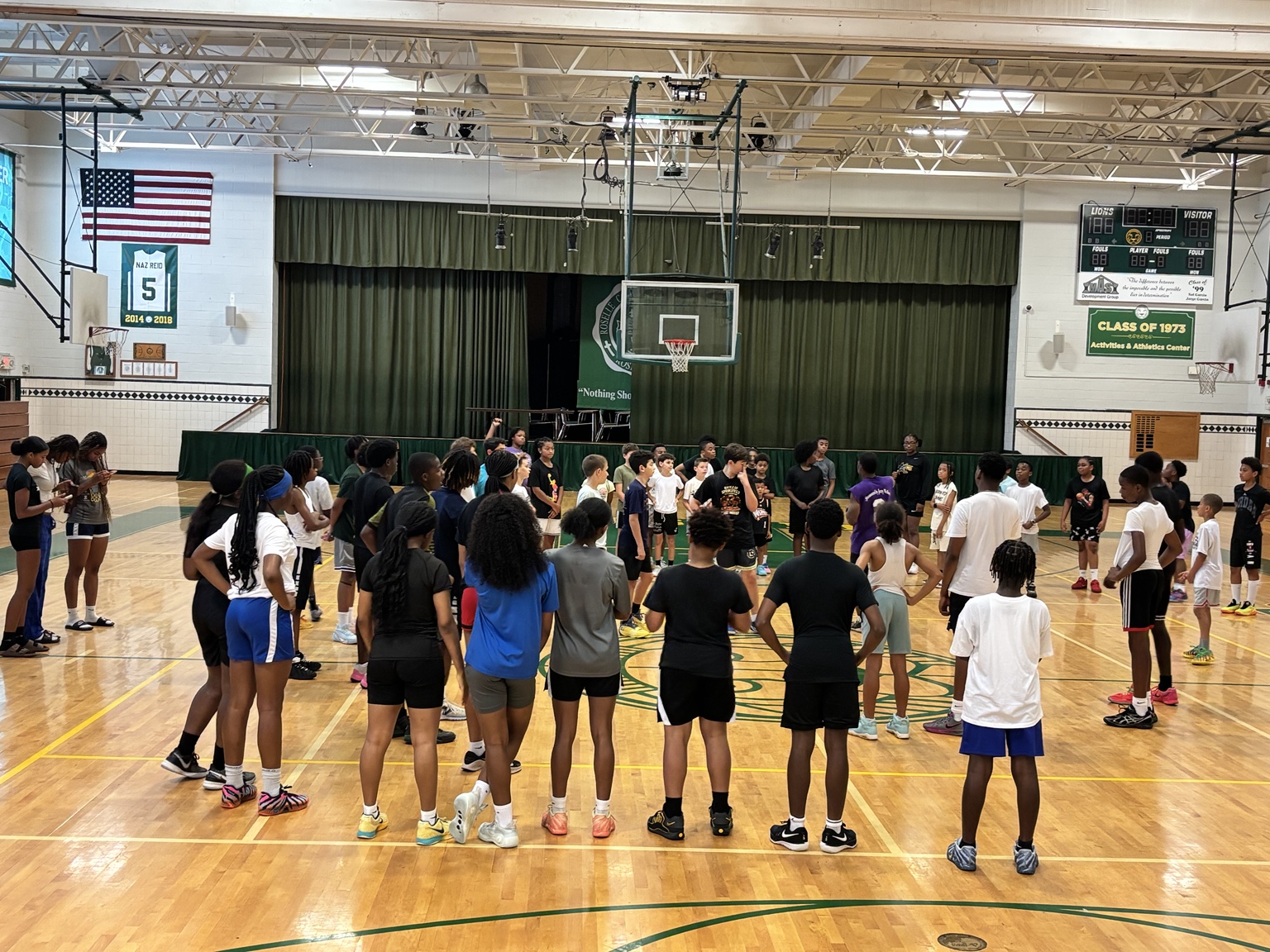 Large circle of players during a training session